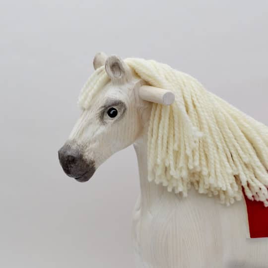 Detail hlavy houpacího koně Čenda 39 bělouše
